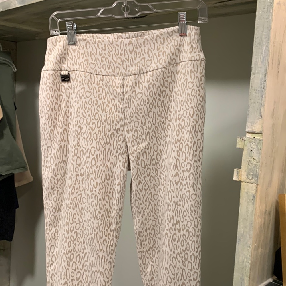 Very nice pants.   Worn once to a business function.   Beautiful animal print.